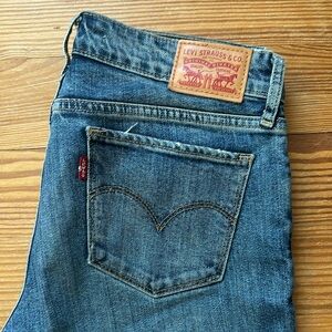 Levi’s 711 skinny medium blue slight distressing 28x34 long inseam jeans